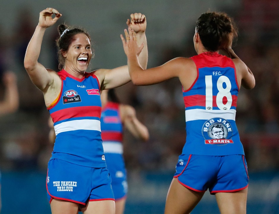 AFLW 2017 Rd 01 - Western Bulldogs v Fremantle MELBOURNE, AUSTRALIA - FEBRUARY 4: Emma Kearney of the Bulldogs (left) celebrates with Libby Birch of the Bulldogs during the 2017 AFLW Round 01 match between the Western Bulldogs and the Fremantle Dockers at VU Whitten Oval on February 4, 2017 in Melbourne, Australia. (Photo by Adam Trafford/AFL Media)